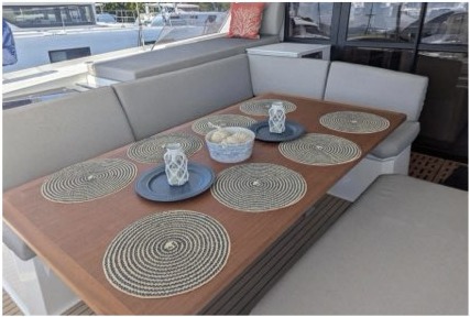 Outdoor dining table set on the aft deck