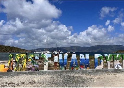 The Jost Van Dyke welcome sign on the beach